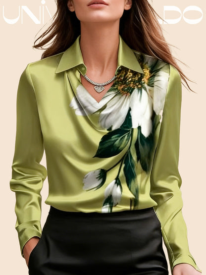 Blusa brillante con chaqueta profunda y drapeado fluido