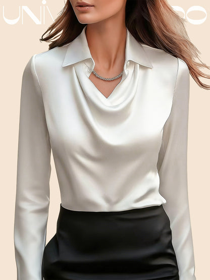 Blusa brillante con chaqueta profunda y drapeado fluido