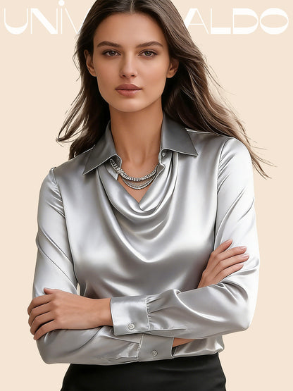 Blusa brillante con chaqueta profunda y drapeado fluido