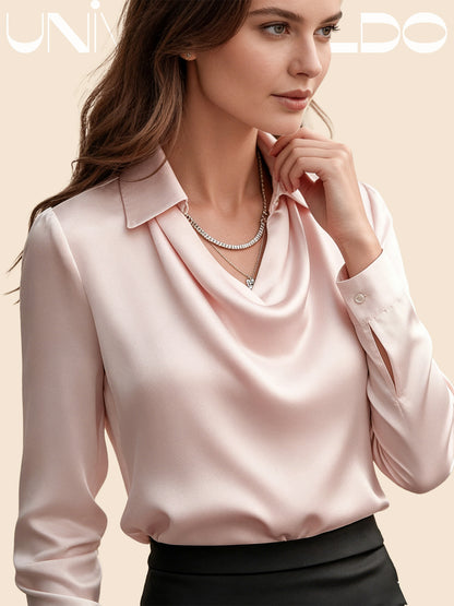 Blusa brillante con chaqueta profunda y drapeado fluido